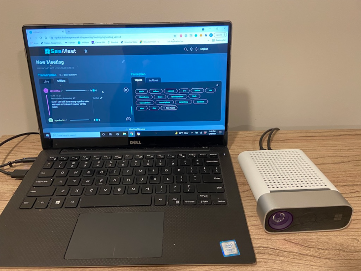 SeaMeet's improved interface showing speaker identification and AI topic extraction